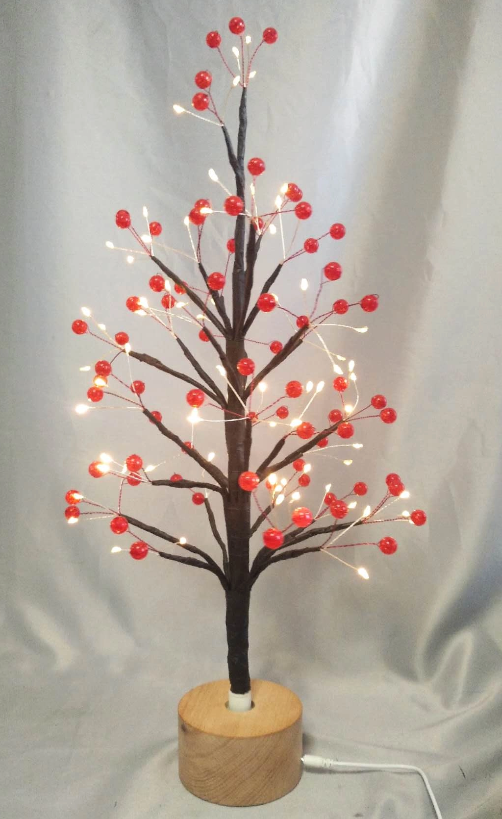 60厘米红圆珠干的树灯，带有木制旋转底座